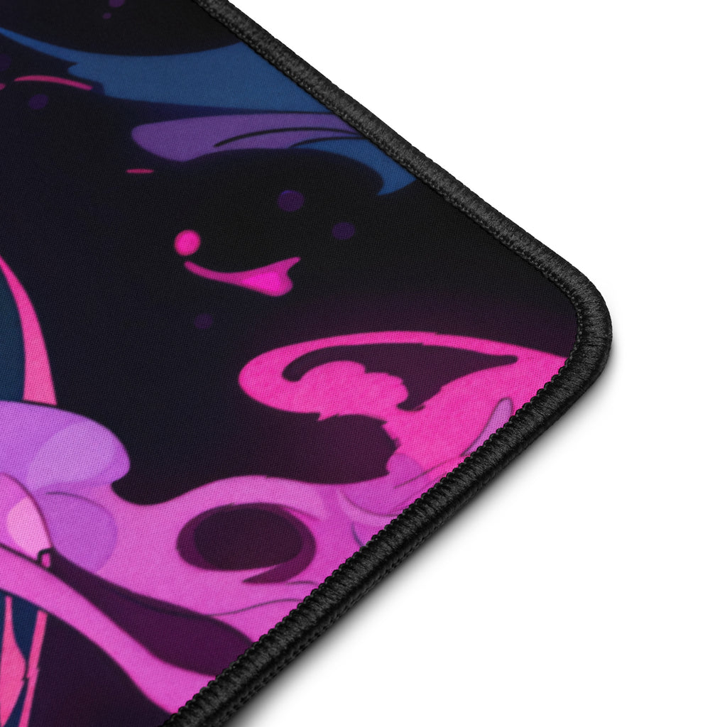 Mouse pad with pink and purple abstract design on a black background