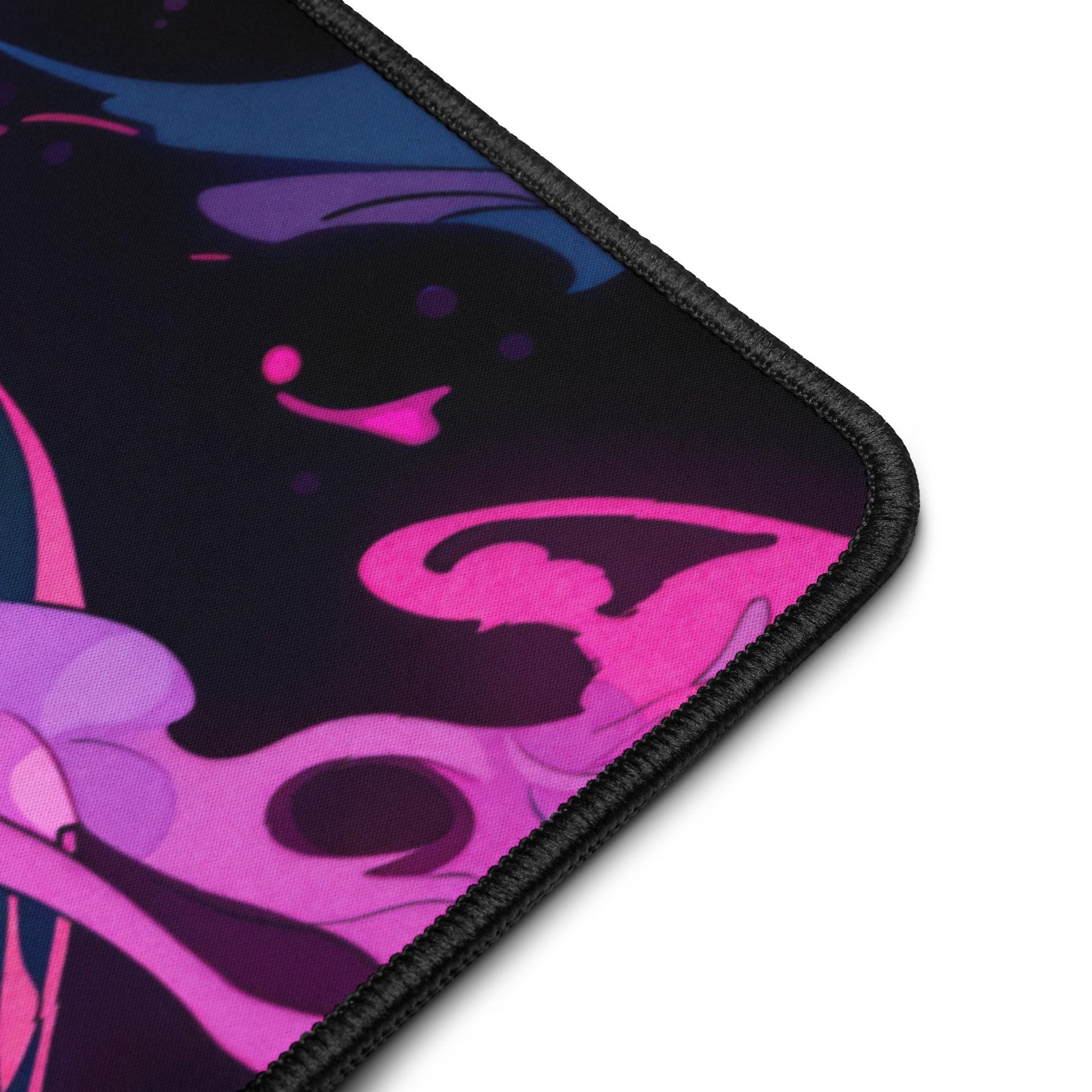 Mouse pad with pink and purple abstract design on a black background